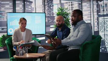 Powerful people in a professional briefing meeting engaging in negotiation, investment planning with focus on performance metrics and opportunity. Corporate development. Camera A. video