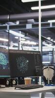 Vertical Monitors displaying status of data center hardware supporting AI training workflows and automated infrastructure systems. PC screens tracking servers processing machine learning datasets video
