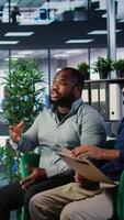 Vertical Office life showing frustration and dispute during a business discussion, with leaders are facing disagreement and workplace tension in a multicultural goal oriented company. Camera A. video