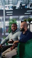 Vertical Corporate leadership group in a business meeting aligning goals through vision, creating a fruitful partnership for a success story. Meeting focused on negotiation and decision making. Camera A. video