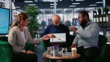 Business meeting with determined leaders working through strategy for a new partnership, review insights and analysis to strengthen corporate leadership and investment initiatives. Camera A. video
