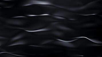 Dark Flow Motion Background Loop. Visual representation of a dark, flowing fabric against a black background. The fabric's undulating waves and subtle sheen create a sense of movement. video