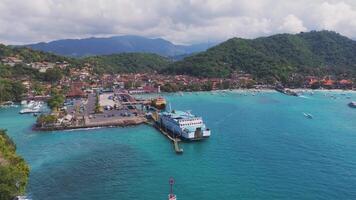 Aerial view of ferry dock at tropical Lombok island in Indonesia video