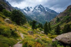 Scenic mountain view with lush greenery and cloudy sky. photo