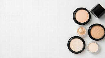 Makeup and brushes on white background photo