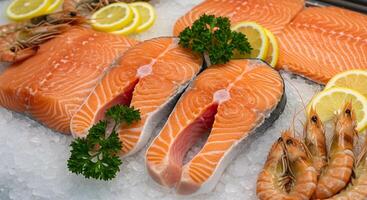 Fresh Salmon Fillet and Shrimp on Ice photo