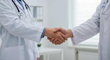 Doctor Handshake in White Coat photo
