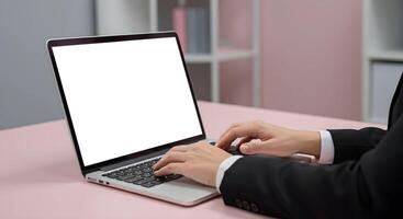 Laptop Typing on Desk with Blank Screen photo