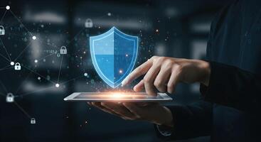 Shield on Tablet Security and Protection Concept photo
