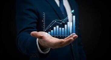 Hand Holding Graph Showing Business Growth photo