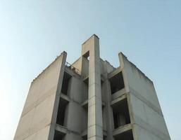 Unfinished Concrete Building Under Blue Sky photo