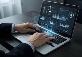 Laptop Data Analysis - Person Typing on Keyboard with Charts photo