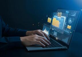 Laptop with Data Analysis and File Management photo
