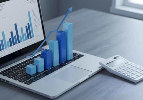 Data Chart on Laptop with Calculator on Table photo