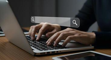 Typing on Laptop - with Search Bar photo
