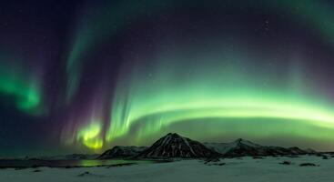 Aurora Borealis Over Snowy Landscape photo