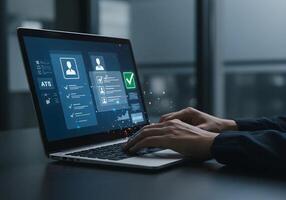 Person Using Laptop for Application Tracking System photo