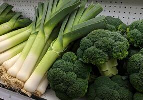 Fresh Leeks and Broccoli on Display photo