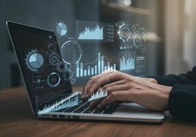 Laptop with Data Graphics Overlay photo