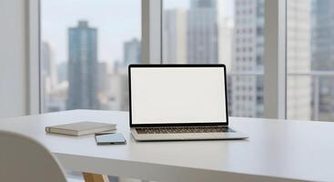 Laptop on Desk in Office Setting photo