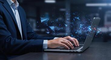Businessman working on laptop with abstract digital network overlay photo
