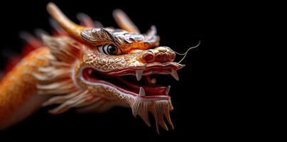 Closeup of an Ornate Golden Dragon Statue against a Black Background A Detailed Look at the Intricate Carvings and Rich Colors of the Mythological Creature photo