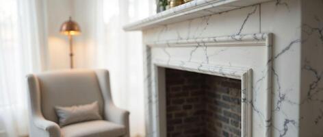 Elegant marble fireplace and cozy armchair in stylish room photo