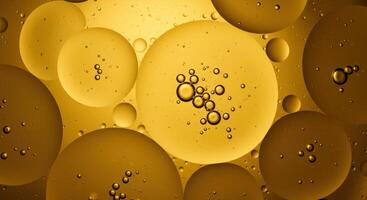 Abstract golden oil bubbles floating creating a mesmerizing visual effect photo