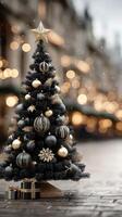 Elegant black and gold Christmas tree decorated with ornaments and presents in a festive urban setting photo