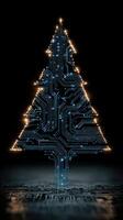 Christmas tree design made of circuit board patterns illuminated with lights in a dark setting photo