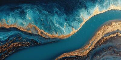 Swirling blue waters with golden accents create a stunning abstract landscape photo