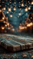 Evening atmosphere with glowing lights and wooden table at a festive outdoor location in autumn photo
