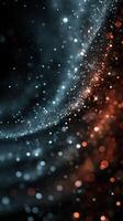 Swirling particles create a mesmerizing cosmic effect with contrasting colors in a dark background photo