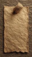 Rustic paper tag with rope hanger on textured surface emphasizes simplicity and natural materials in design aesthetics photo