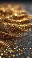Sparkling gold glitter covering a surface creates a shimmering visual effect in soft lighting photo
