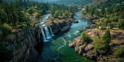 Breathtaking waterfall flowing into serene river surrounded by lush forest in daytime setting photo