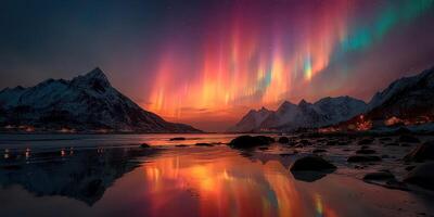 Bright aurora borealis lights up the snowy mountains and calm waters in Norway during the evening hours photo