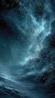 Cosmic landscape showcasing deep blue hues and starry sky at night in a serene, otherworldly environment photo