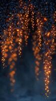 Magical lights glow through hanging foliage in a serene outdoor setting at dusk, creating a warm and enchanting atmosphere photo