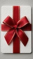 Beautifully wrapped gift with red ribbon creates a festive atmosphere for special occasions photo