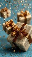 Golden gift boxes with bows and shimmering confetti in a festive celebration setting photo