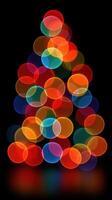 Brightly colored holiday lights create a cheerful tree shape against a dark backdrop during festive celebrations photo