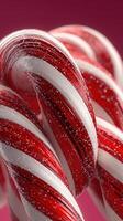 Colorful twisted candy canes with shiny surface and festive appearance for winter celebrations photo