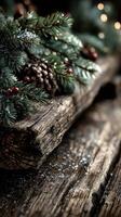 Decorative pine branches with red berries and pine cones on rustic wooden surface during holiday season photo