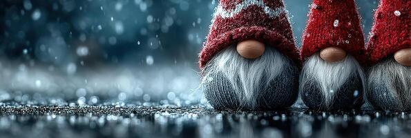 Two whimsical gnomes with radiant red hats sit on a snowy surface during a gentle snowfall in a winter setting photo