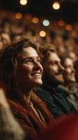 Audience enjoys live performance with smiles in a cozy venue during evening hours photo