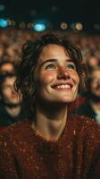 Audience enjoys live performance with joyful expressions under bright lights photo