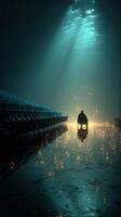 Mysterious figure in a submerged theater with sparkling water and illuminated rays at dawn photo