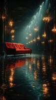 Elegant red sofa reflects in a dimly lit hallway with golden chandeliers and watery floor at night photo
