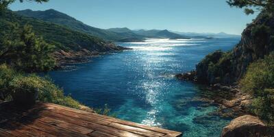 Beautiful coastal view with shimmering water and distant hills during a clear sunny day in nature photo